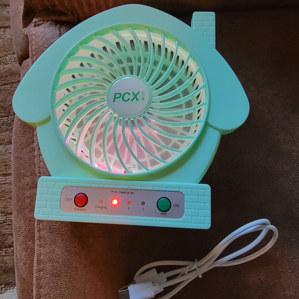 New In Box Mini house fan w 3 speeds and USB cable